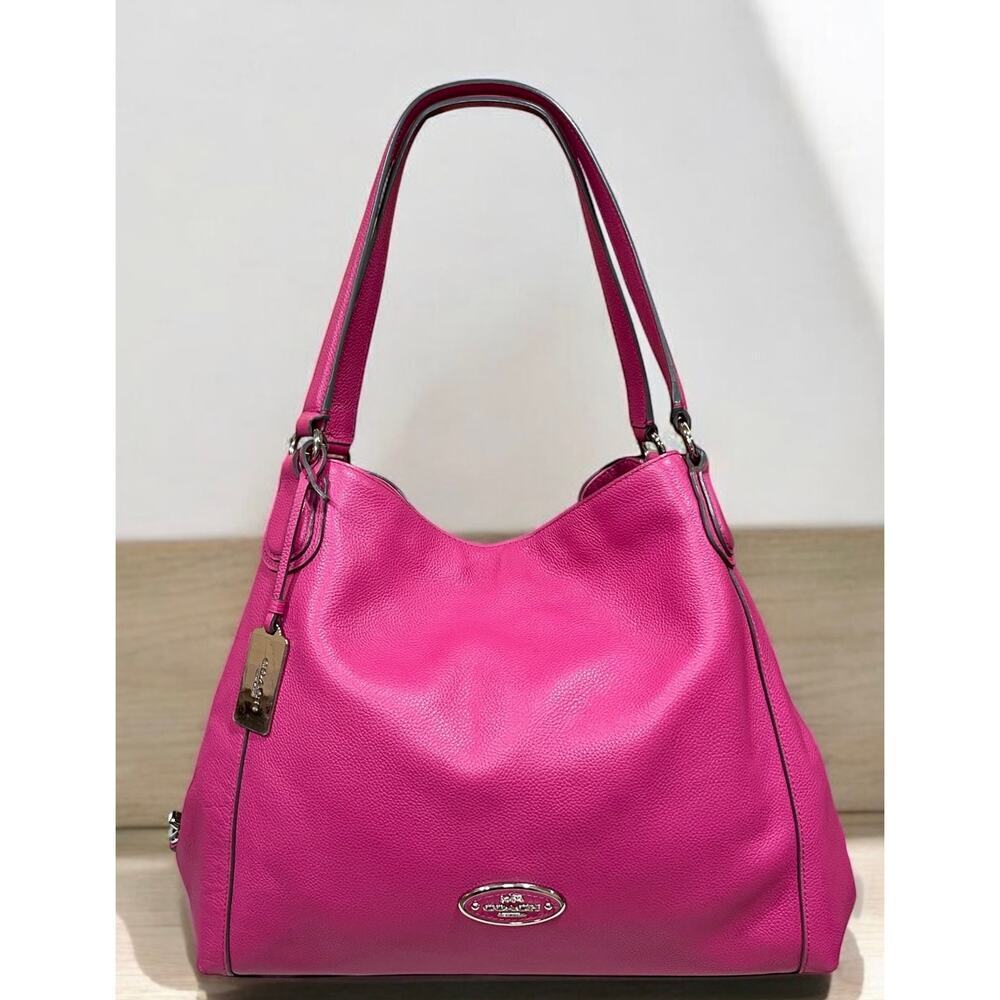 Coach 33547 Edie Leather Turn
Lock Hot Pink Leather Shoulder Bag